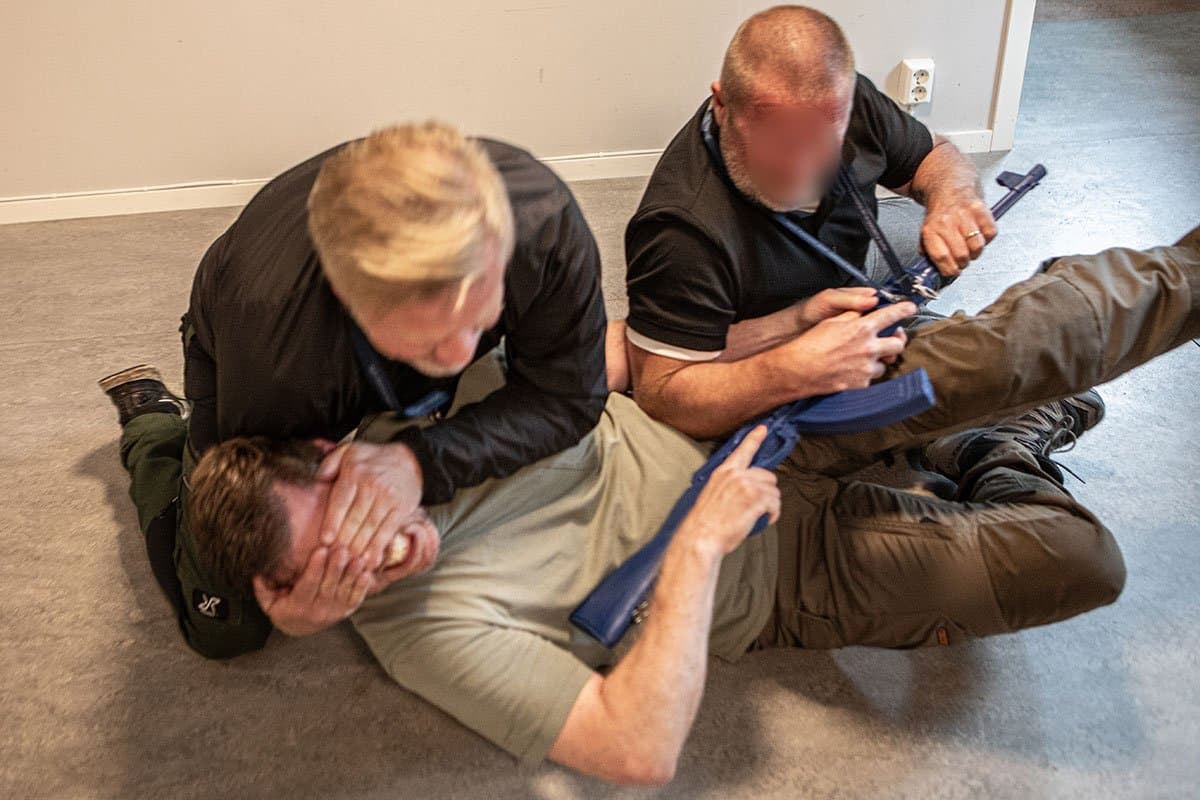 Close-quarters disarming drill indoors