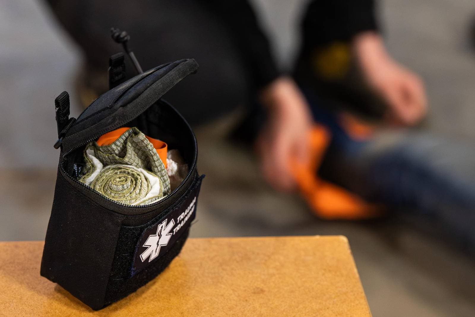 Open trauma pouch labeled Trauma Training